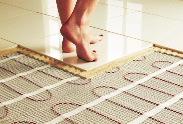 Kodėl verta namuose įsirengti grindinį šildymą?